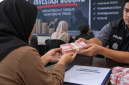 Ilustrasi dibat dari AI menggambarkan korban investasi bodong dikembalikan asetnya. (Kredit Foto: Istimewa)